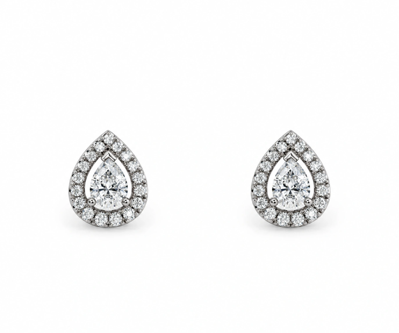 Águila Arpía · Topos con halo envolvente de diamantes — Oro blanco 18k