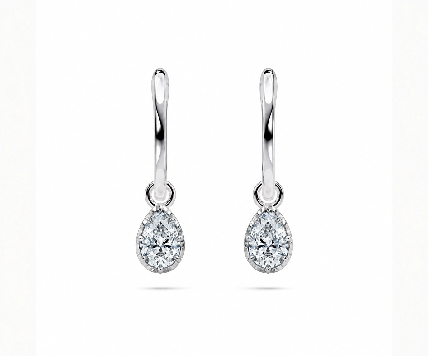 Lirio · Aretes colgantes — Oro blanco 18k