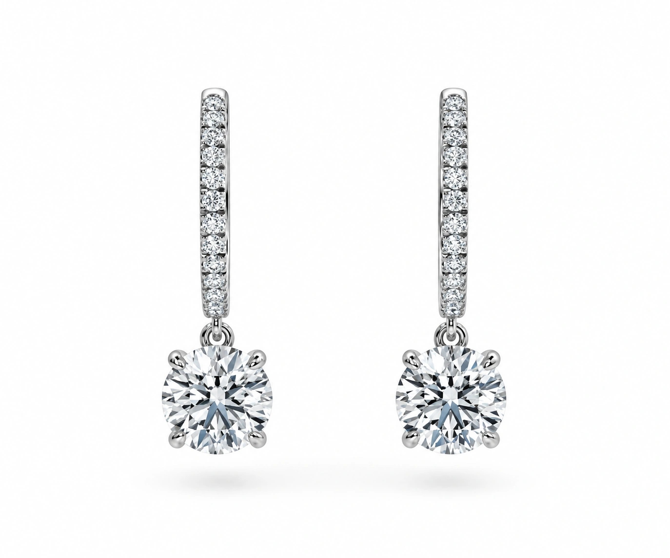 Flor de Mayo · Aretes colgantes — Oro blanco 18k