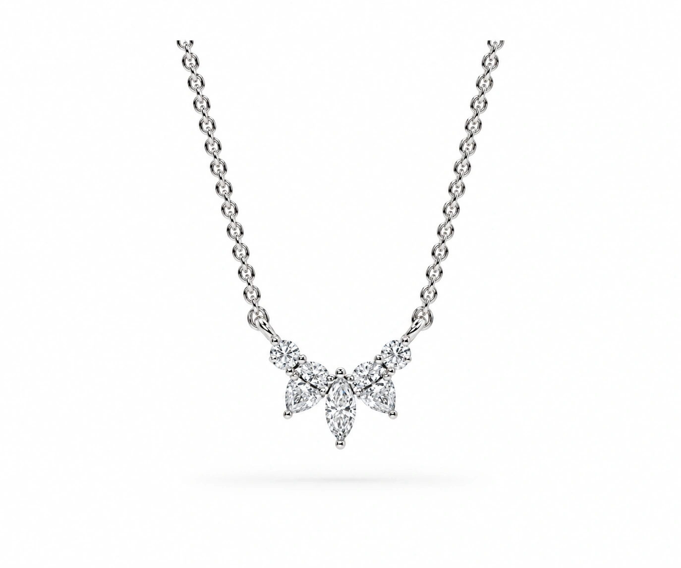 Laguna Verde · Dije floral con diamantes marquesa, pera y redondos — Oro blanco 18k