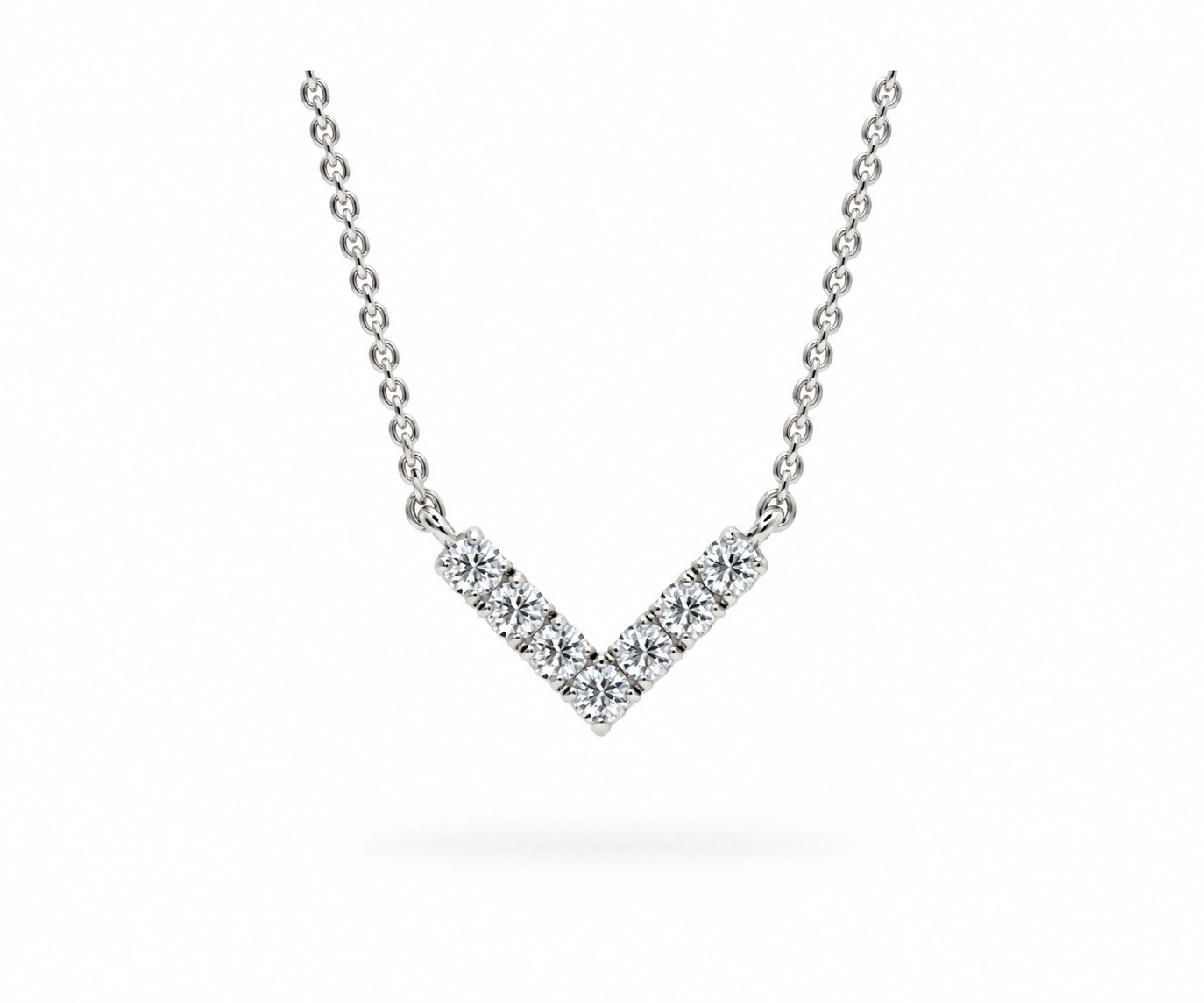 Serranía · Dije de diamantes en V — Oro blanco 18k