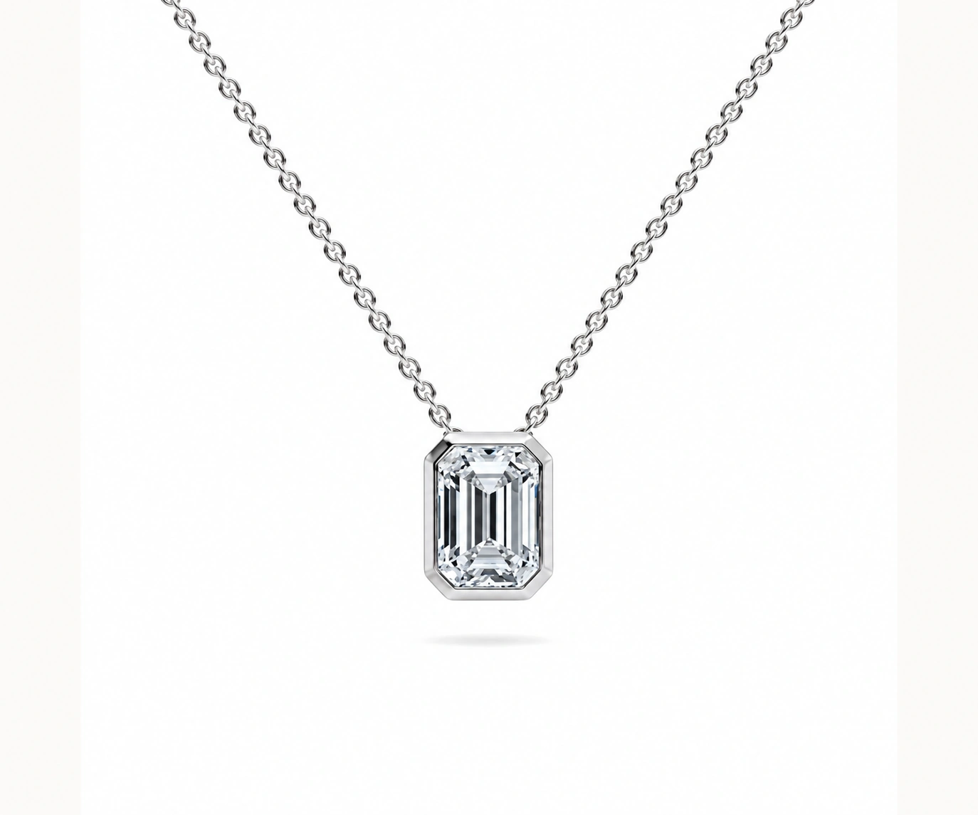 Río Claro · Dije de diamante talla esmeralda en bisel — Oro blanco 18k