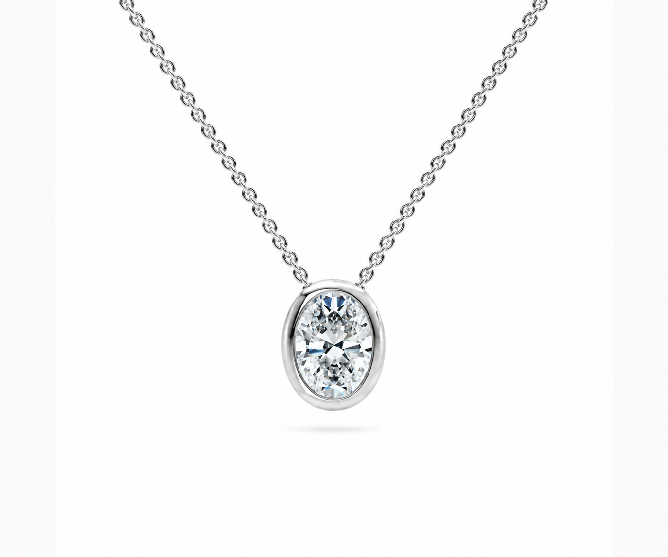 Laguna Azul · Dije con diamante ovalado en bisel — Oro blanco 18k