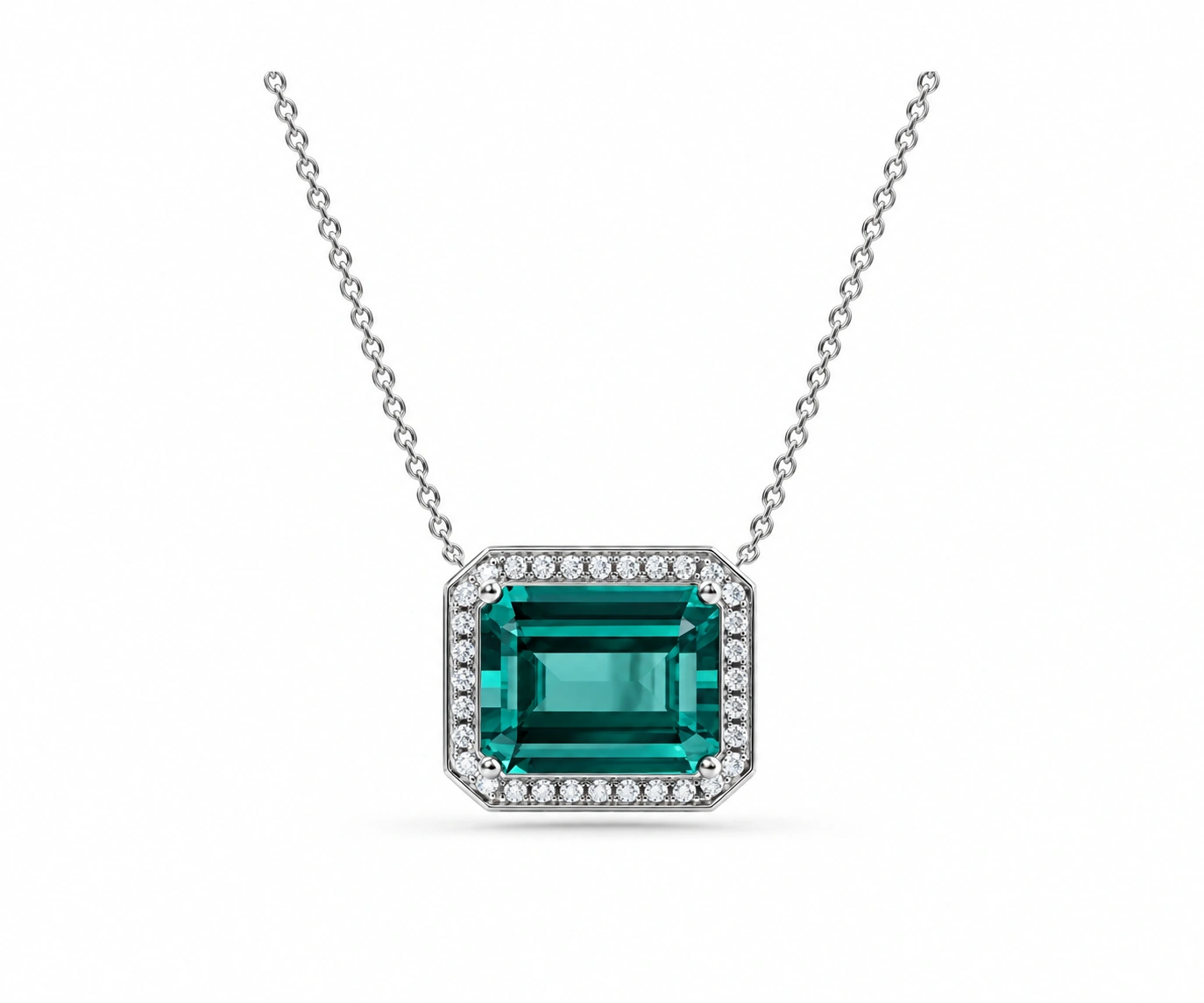 La Guajira · Dije con esmeralda colombiana talla esmeralda y halo de diamantes — Oro blanco 18k