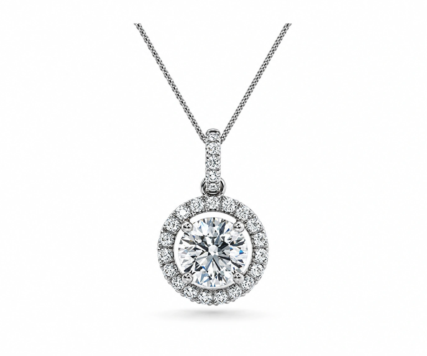 El Cocuy · Dije de diamante redondo con halo y asa en pavé — Oro blanco 18k