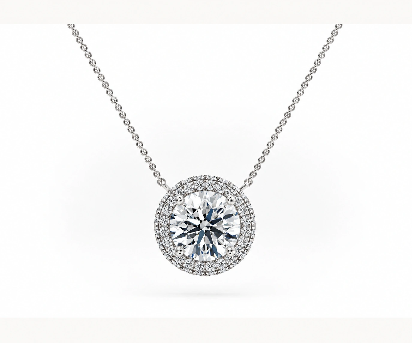 Selva Dorada · Dije con doble halo de diamantes — Oro blanco 18k