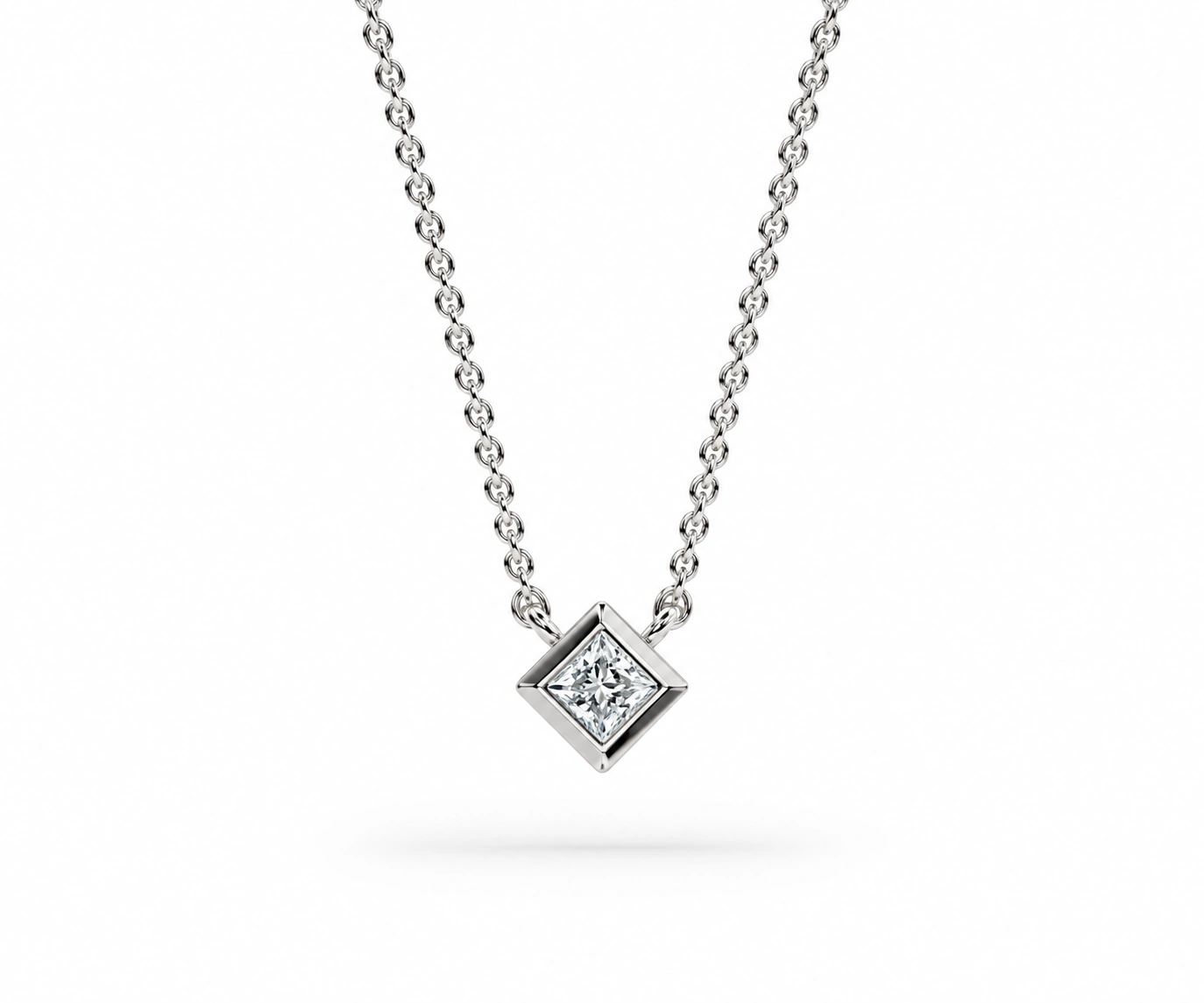 Guainía · Dije con diamante princesa en bisel — Oro blanco 18k